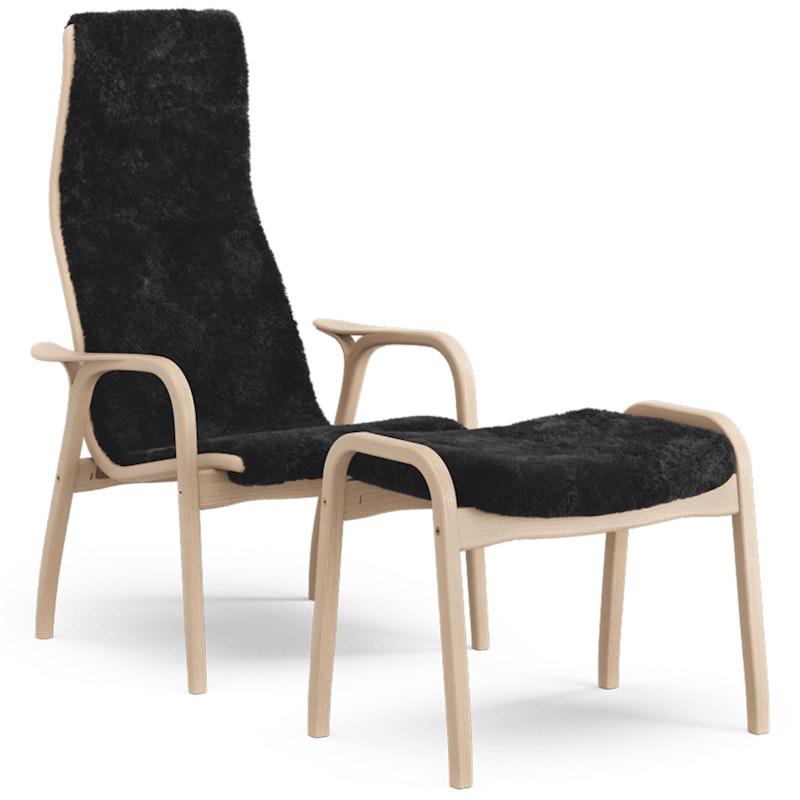 Lamino Sessel mit Fußhocker Schaffell, Schwarz / Lackiertes Buchenholz